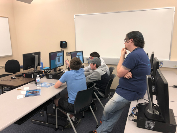 College student assists in Cyber Camp