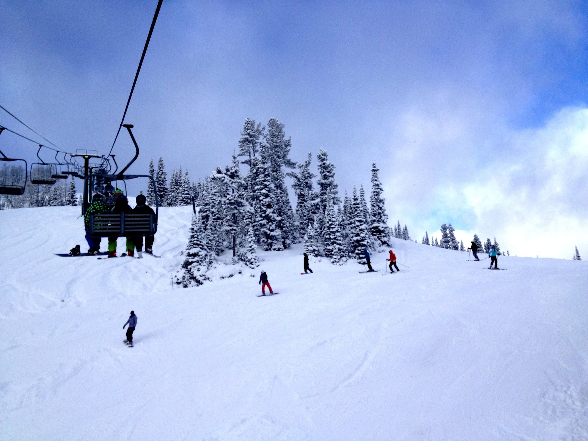 Chairlift and skiers at Showdown ski area