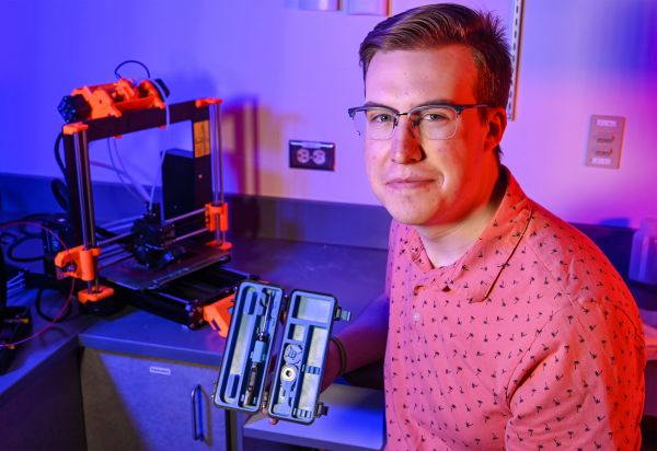 Elliot Roberts created a tool box for his soldering iron with the college's 3D printer. He is encouraging more students to make use of the printer.