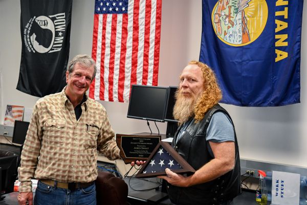 Ja Sweat, right, receives Great Falls College MSU Student Veterans Award from Kevin Lyons, Wednesday, Nov. 9, 2022. 