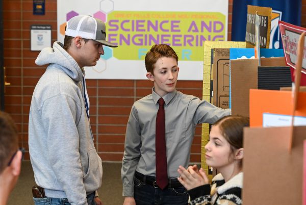 Isaac Snyder, a seventh-grader from Cascade, presents his project to judge Tyler Lapierre during the Great Falls College MSU Regional Science and Engineering Fair on Thursday.