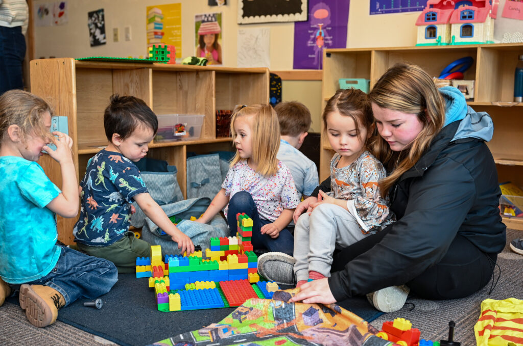 Photo of young children in a classroom.