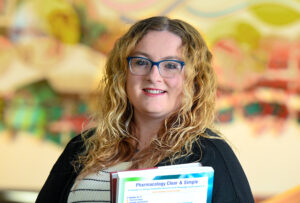 Photo of Jensa Baumgartner, selected as a Newman Civic Fellow.