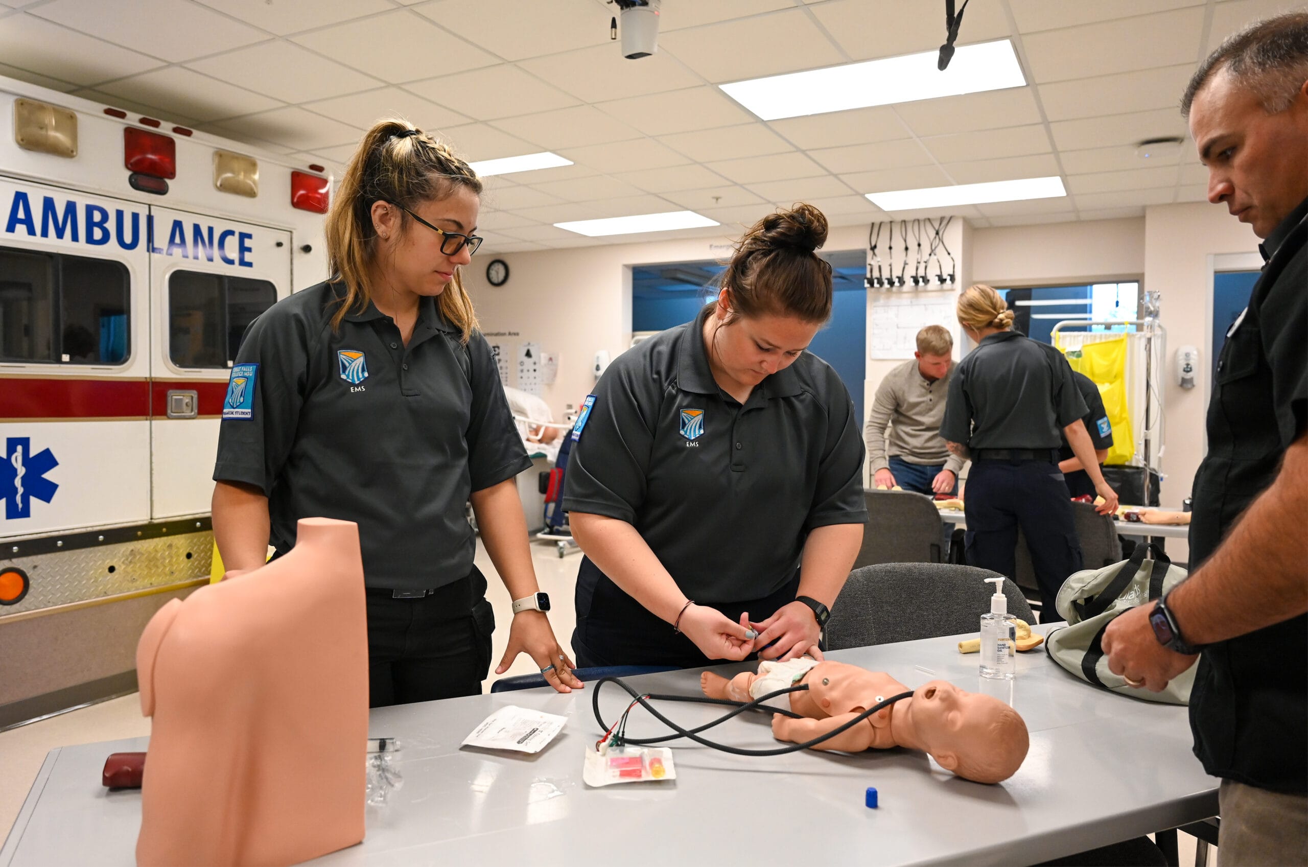 Paramedic students in a lab classroom.